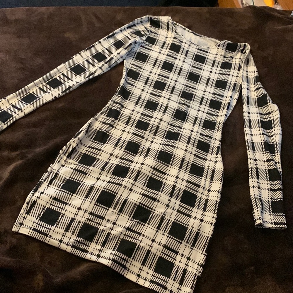 Plaid bodycon dress in the size Small. Goes just above the knee.